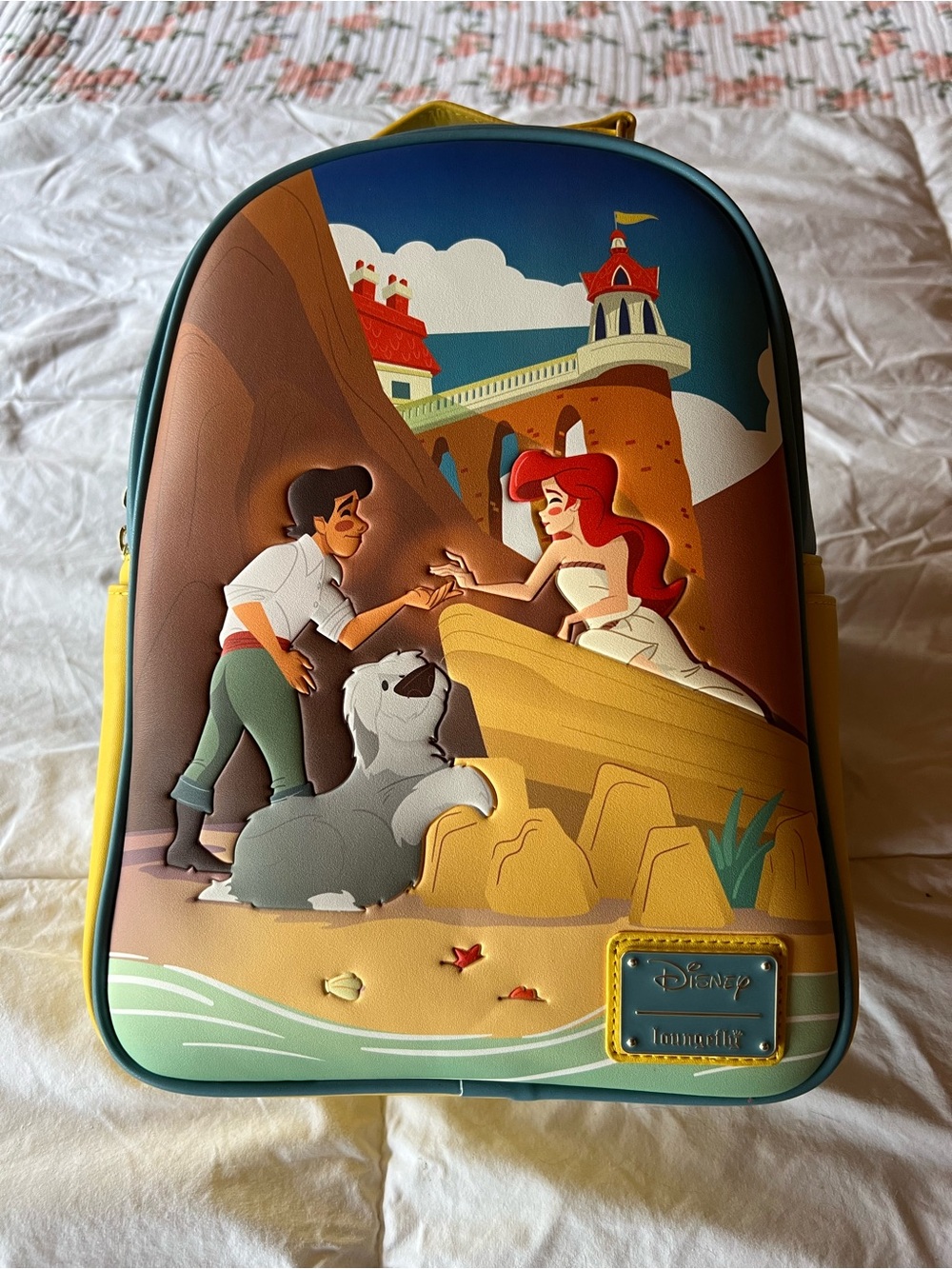 Loungefly Little Mermaid Teal and Yellow Disney Backpack with Hard Loun Plaque